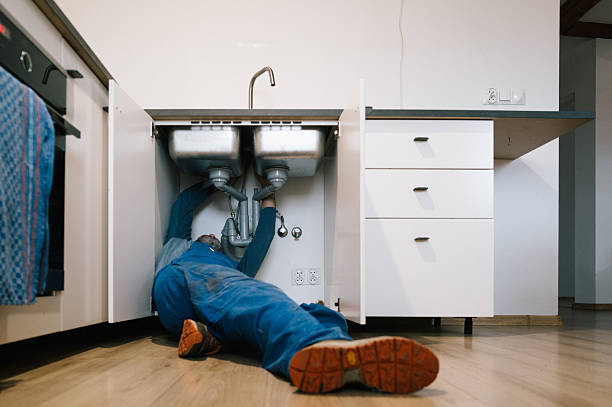 Professional Emergency Plumber technician working in Oak Island, NC